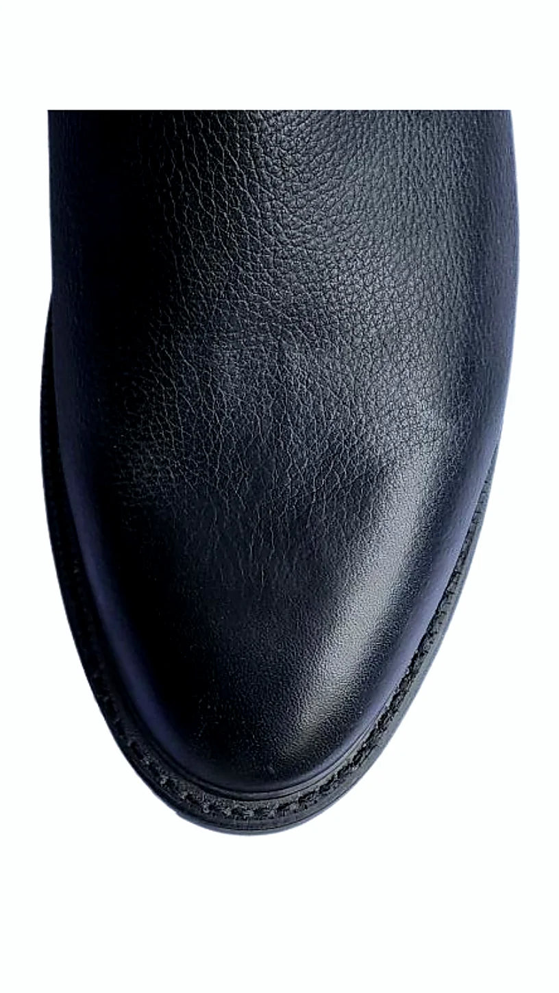 Plain black boot with a rounded toe box