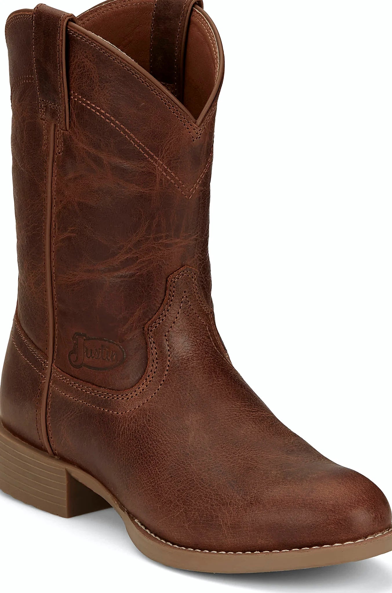 Round toe boot with an oil and slip resisting outsole
