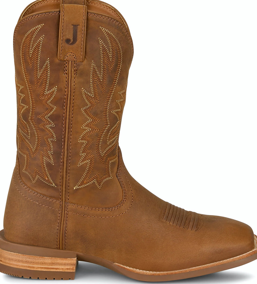Cowhide vamp western boot with a woven lining