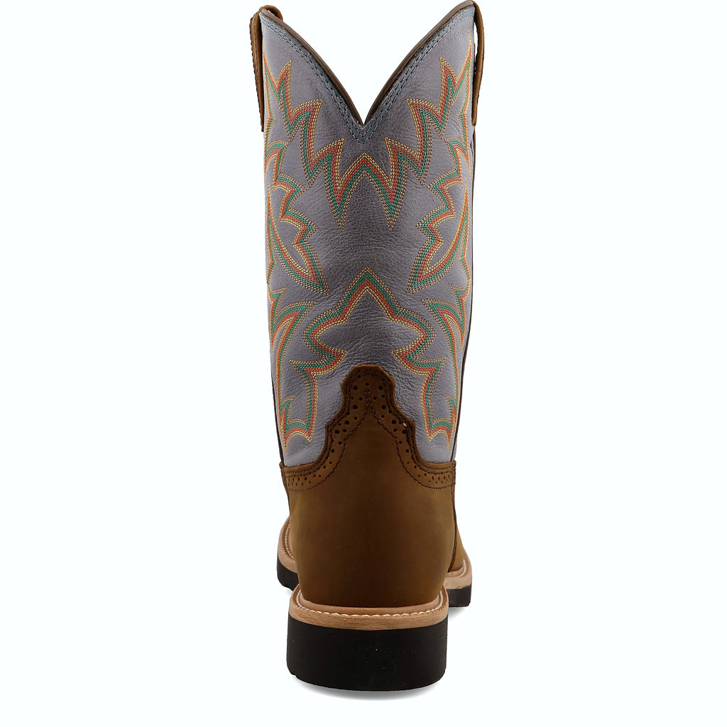 Work boot with double-stitched pull tabs and a storm welt