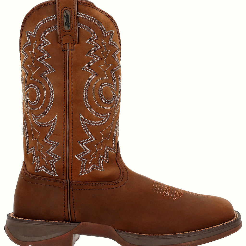 Western boot with fancy shaft stitching and a toe bug