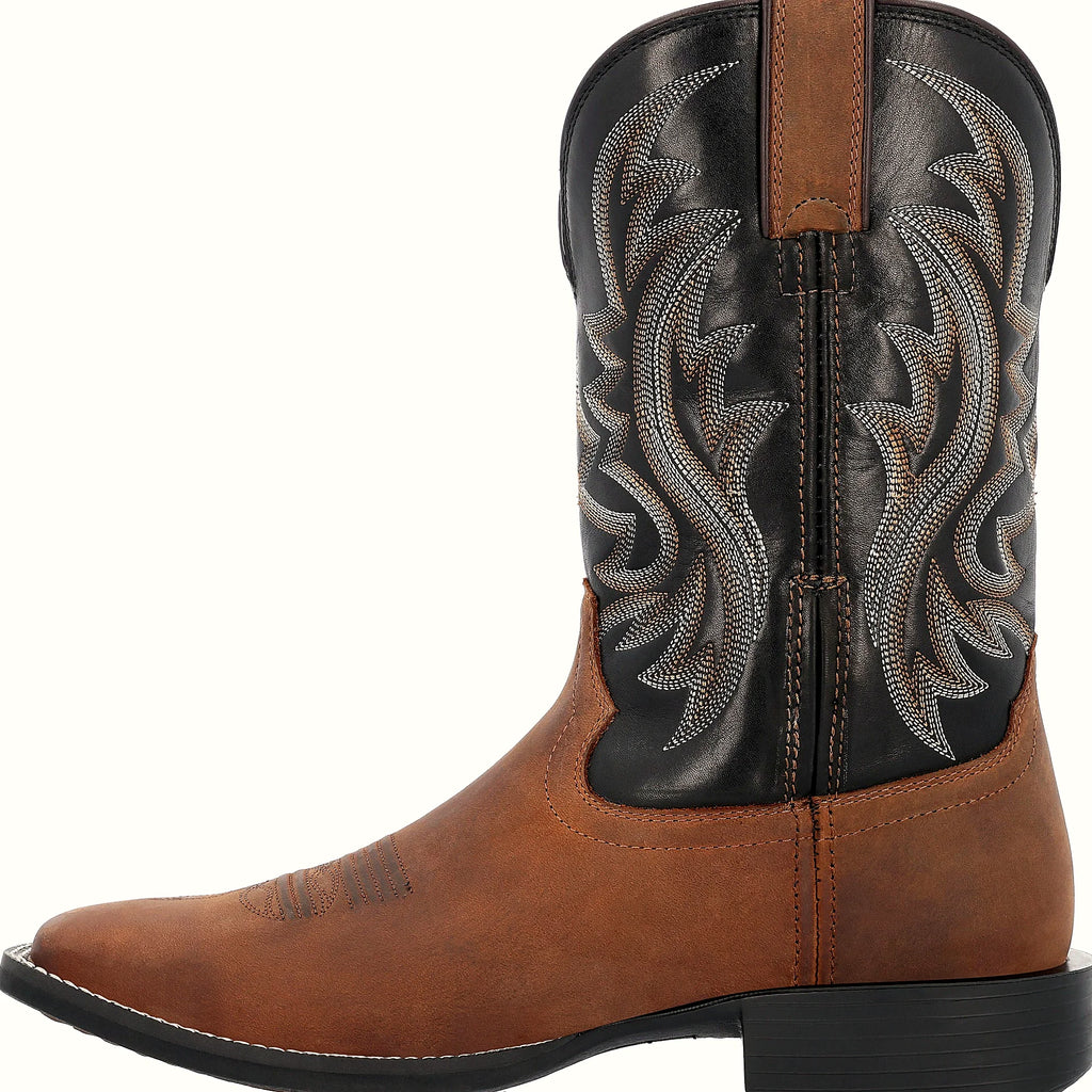 Brown square toe western boot with a rocker heel