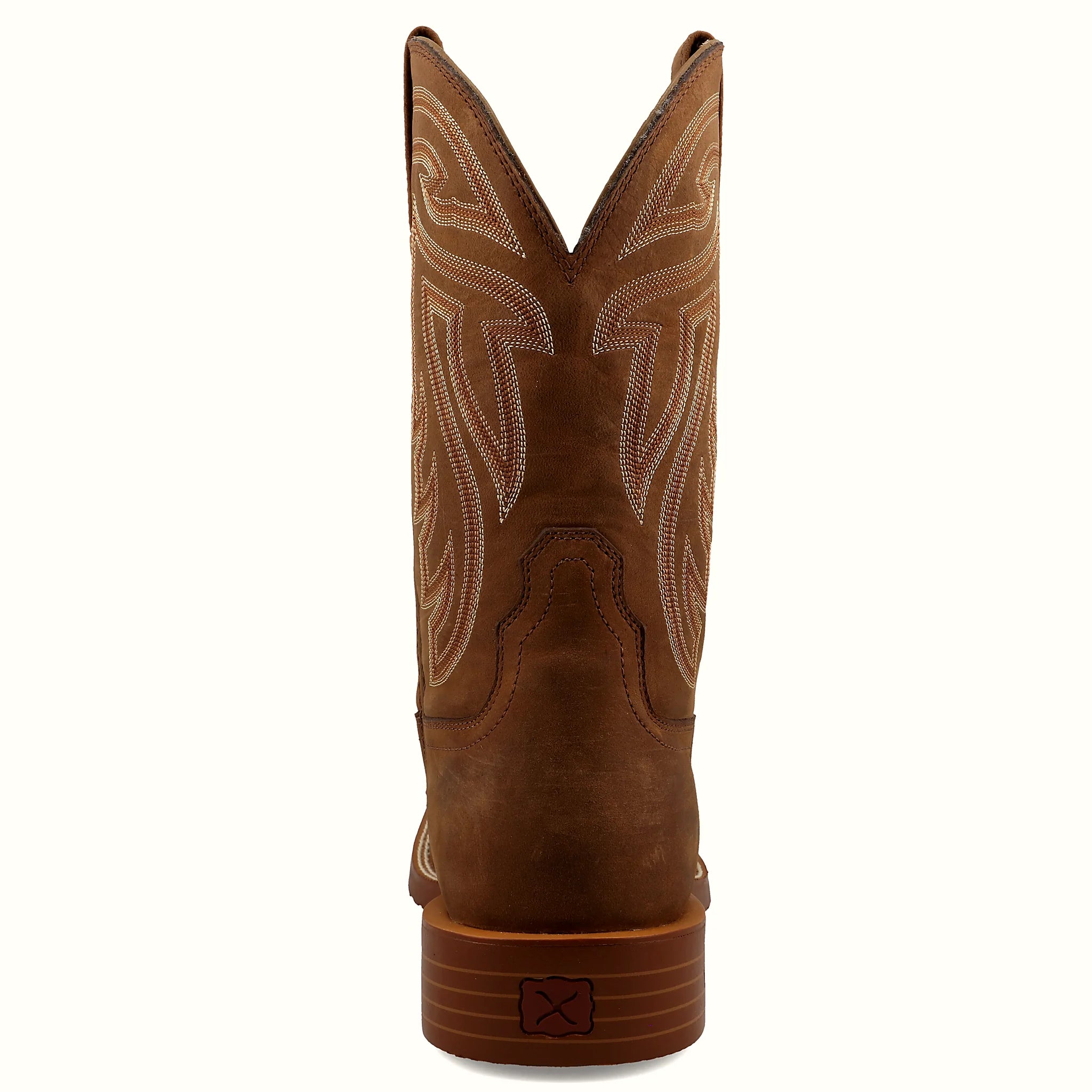 Boot with a walking heel and integrated spur shelf