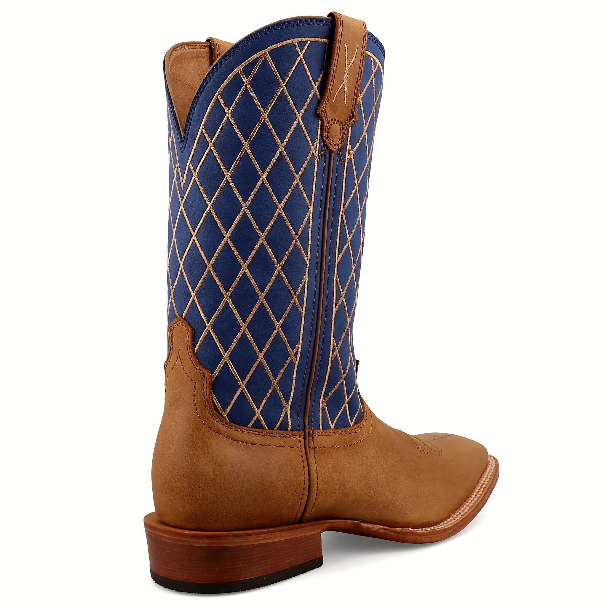 Western boot with an integrated spur shelf